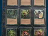a lot of cards that are in a binder