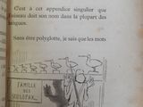 an open book with a drawing of a man and a cat