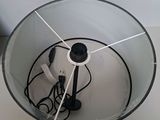 a lamp that is sitting on a table with wires in it
