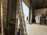 a ladder leaning up against a wall in a building