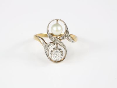 Bague en or jaune et or gris, formée d'un Toi et Moi en form…