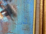 une photo d'une peinture d'avion dans un cadre en or
