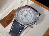 a watch in a box with a tag on it