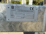 a sign on the side of a metal structure