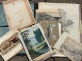 a pile of old books sitting on the ground