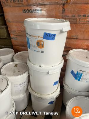 several buckets of paint are stacked on top of each other