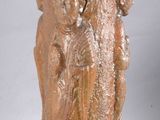 a statue of a woman holding a child in her arms