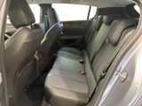 the back seats of a car are empty and the passenger seat is empty