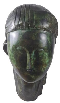 tête de femme en bronze, coiffée d'une coiffe et d'un bandeau