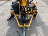 an image of a machine that is parked in a parking lot