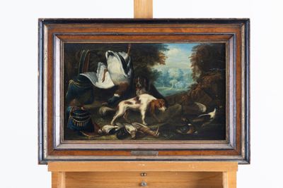 tableau représentant un chien et un canard dans un décor boisé