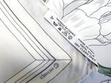 a close up of a pillow with a label on it