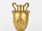 an image of a gold vase with handles on a white background
