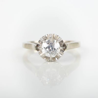 Bague solitaire en or gris et platine sertie d'un diamant ta…