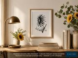 a picture of a desk with a vase of sunflowers on it