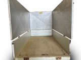an image of a truck bed with the door open