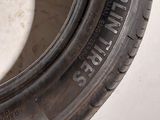 a tire that has been left on the side of the road