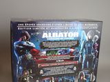 a close up of a box of action figures on a table