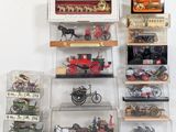 many different types of toy trains and cars on display