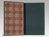 the front and back cover of a book with a gold and red design