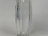 a glass vase that is sitting on a table