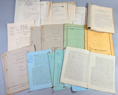 several old books are stacked on top of each other on a table