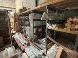 a room filled with lots of boxes and shelves