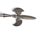an old knife with a broken blade on a white surface
