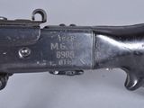 an old gun that is sitting on top of a table