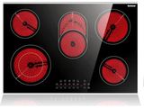 an image of a black and red stove top with four burners