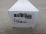 a white box with a barcode on it sitting on the floor