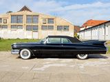 a black car that is parked in front of a building