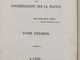 an old book with a black and white title on it