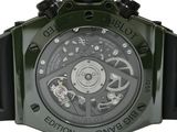 a close up of a watch on a white background