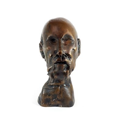 bronze bust of a man with a beard and mustache on a white background
