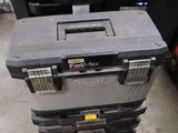 a stack of tool boxes sitting on top of each other