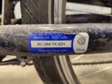 a close up of a bicycle with a sticker on it