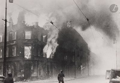 a black and white photo of a fire in a building