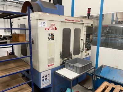 a machine that is sitting in a room with a lot of wood