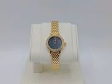 an image of a women ' s watch on display in a display case