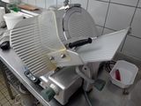 an image of a commercial food processor in a commercial kitchen