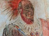 painting of a man with a feather on his head and a feather in his hand