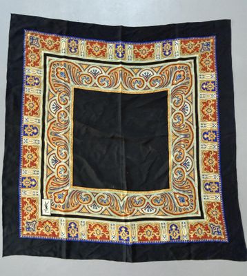 an image of a black and gold square scarf with a blue border