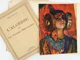 an old book with a picture of a woman in a hat on top of it