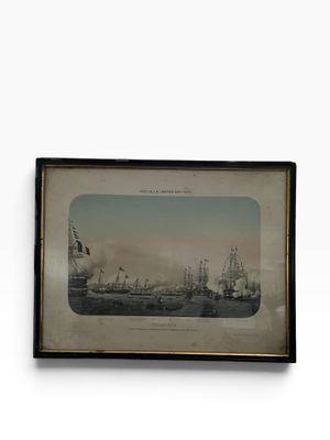 a black and white photo of ships in a body of water