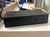 a black box sitting on top of a white desk