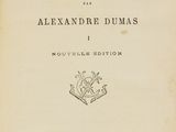 an old book with a black and white title on it