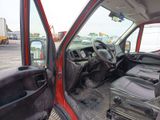 a picture of the inside of a truck with the driver ' s door open