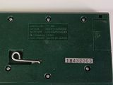 a picture of a close up of a green electrical device