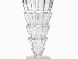 a glass vase that is sitting on a table